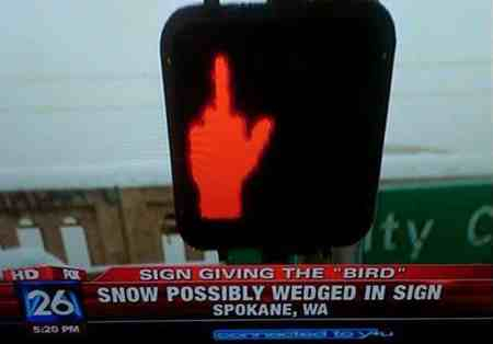 Sign giving the "bird" - meme