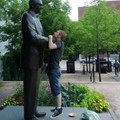 people messin' with statues