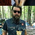 This biker rescued a kitten and token her on the road.