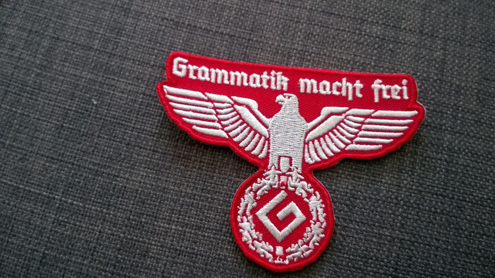 The international Grammar Nazi symbol - meme