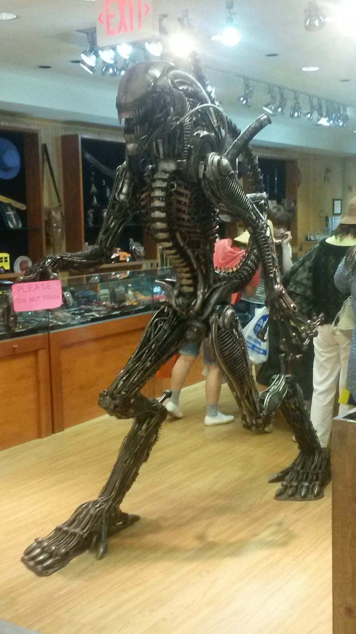Another statue made out of car parts. - meme