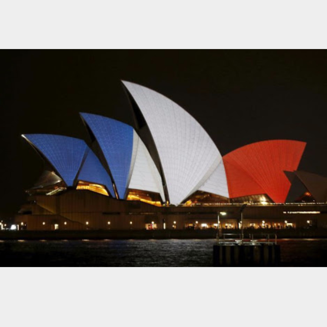 Sydney opera house lit is support of France. Rip - meme