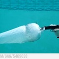 gun being shot underwater
