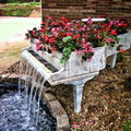 Old piano turned into fountain