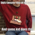cut a hole in his shirt and put his phone through it, and made the fireplace on the sweater