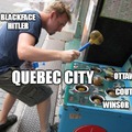 Blackface Hitler plays whack-a-mole with Canadian Freedom Trucker protests.