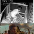 Nursery cam catches baby in crib playing hockey