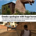 Greeks apologise with huge horse
