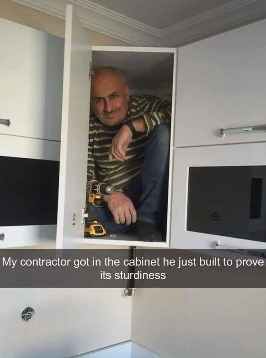 Contractor hopped in the cabinet like it’s a trust fall - meme