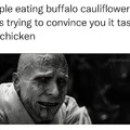 people eating buffalo cauliflower bites
