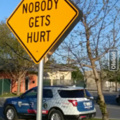 Optimistic Road Sign