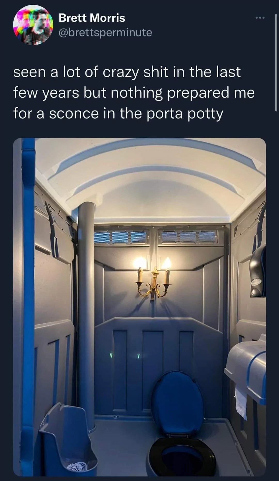 Sconce in a porta potty - meme
