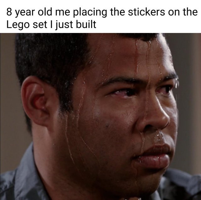 8 year old me placing the stickers on the Lego set I just built - meme