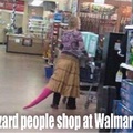 Okay she might be more of the raptor persuasion than lizard but she is shopping at Walmart.