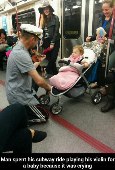 Man playing his violin for a baby - meme