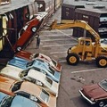 Until the early 1970s automobiles moved by rail were transported in boxcars.