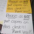 Please do NOT put copies on this desk.