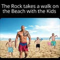The Rock takes a walk on the beach with the Kids
