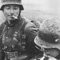 WWI soldier lights cig with flamethrower