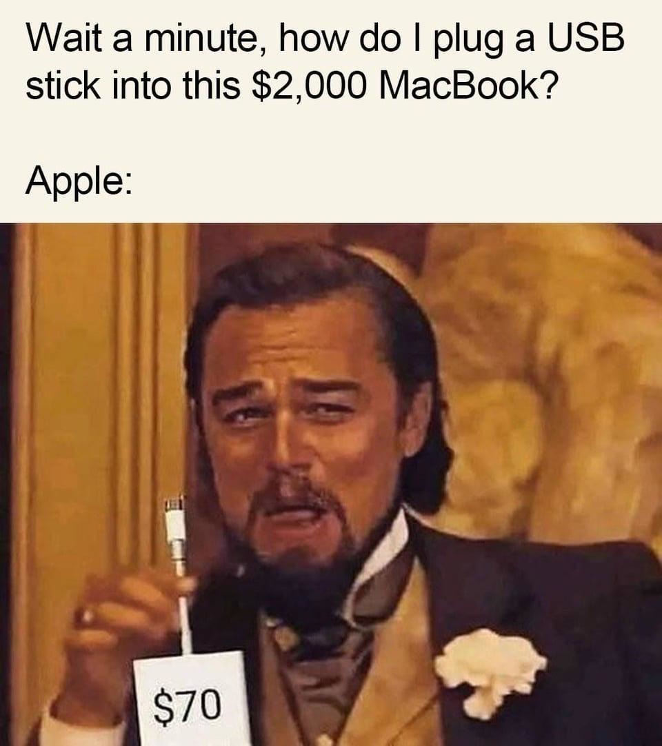 Apple users when they can’t find a USB port on a $2K MacBook - meme