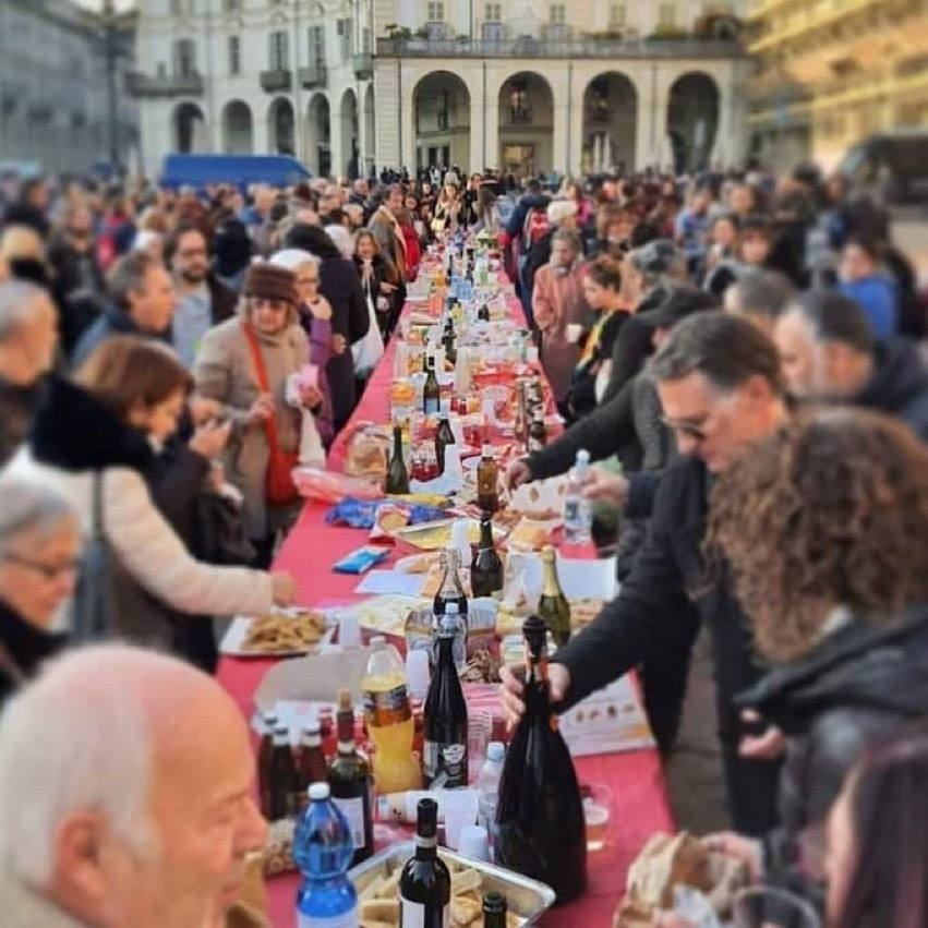 Citizens of Turin Italy dine together in the streets to protest vaccine passports. This is the way. Massive, peaceful and in unison - meme