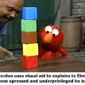 Gordon uses visual aid to explain to Elmo how opressed and underpivileged he is