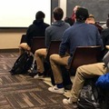 Meeting of the "Jake from State Farm" clones wearing their required  khaki pants.
