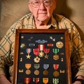 LAST SURVIVING OFFICER OF D-DAY 1st WAVE. COMPARE THESE REAL MEDALS TO MILLEY’s FAKE MEDALS AND RIBBONS. WHO WORE IT BETTER?? (Photo/info from gab)