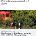 Man dressed as snail races a train and wins