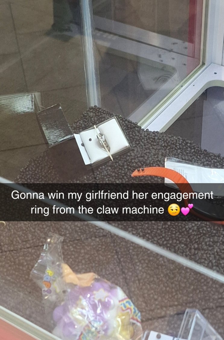 Winning her engagement ring from a claw machine like a champ - meme