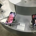 Memedroiders trying tablets in a store