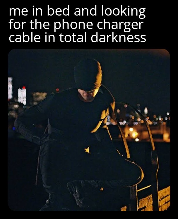 looking for the phone charger in total darkness - meme