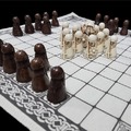 Hnefatafl - Viking Chess. Vikings loved the game because the king starts at a district disadvantage and has to use cunning and brute force to win