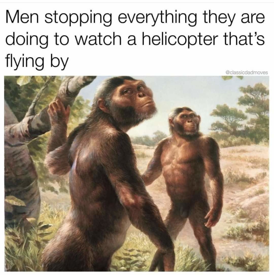 ﻿Men stopping everything are doing to watch a helicopter that’s flying by @classicdadmoves they