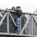 London, a man contemplating suicide, held for an hour by strangers until help arrived to get him down safely.